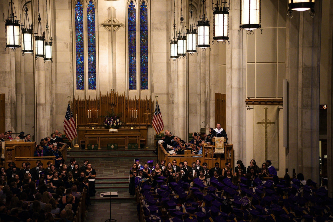 A large group of people gathered inside a big church